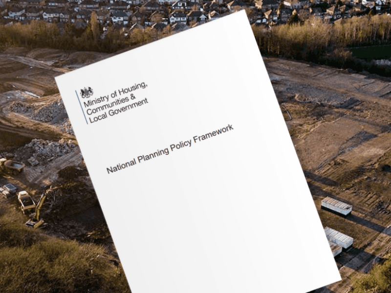 an image of the NPPF document against a building site